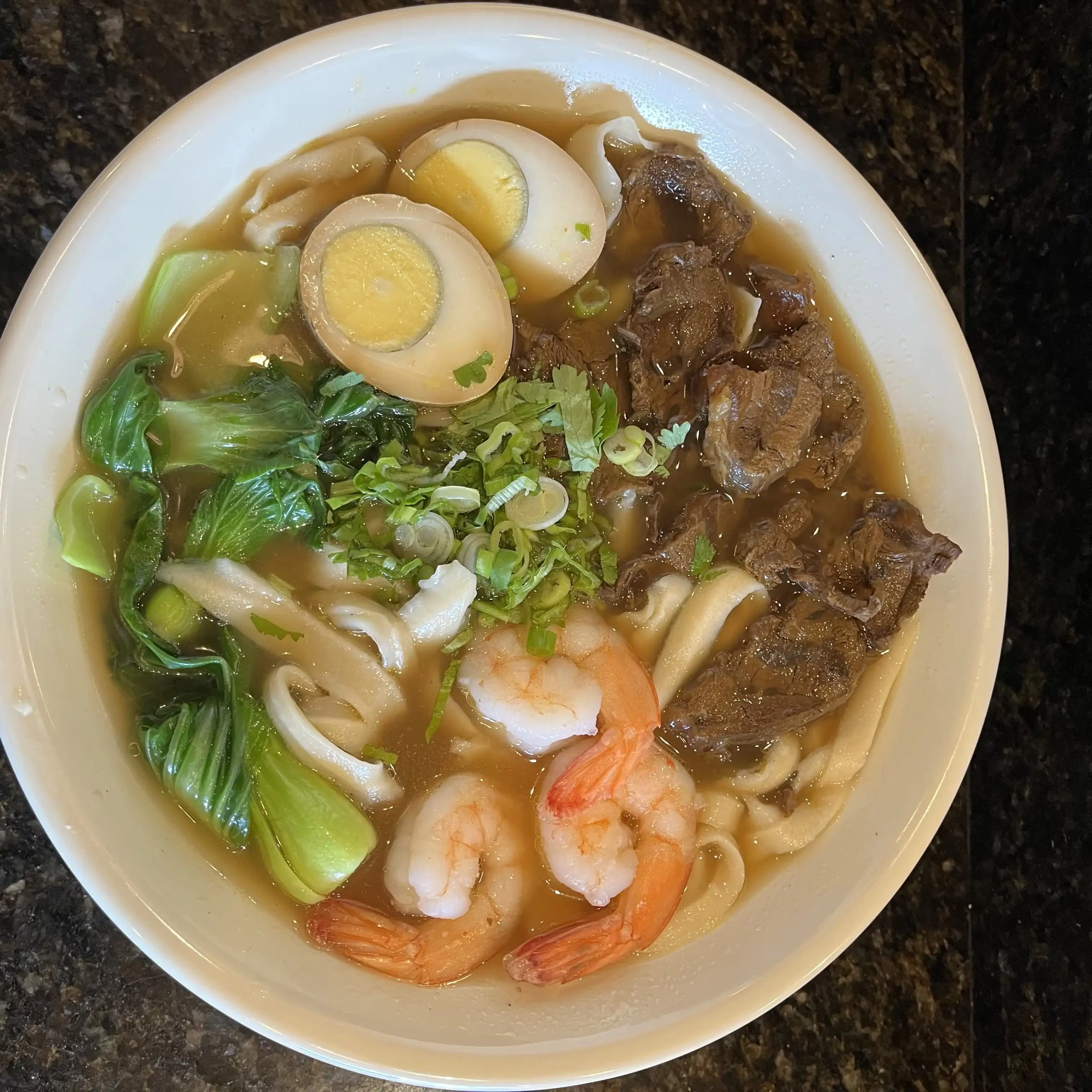 Wonderful-Hand-Pulled-Noodle-Chinese-Noodle-Restaurant-House-Noodle-Soup-Orlando Signature noodle soup with assorted meats and veggies at Wonderful Hand-Pulled Noodle,a Chinese Noodle Restaurant in Orlando