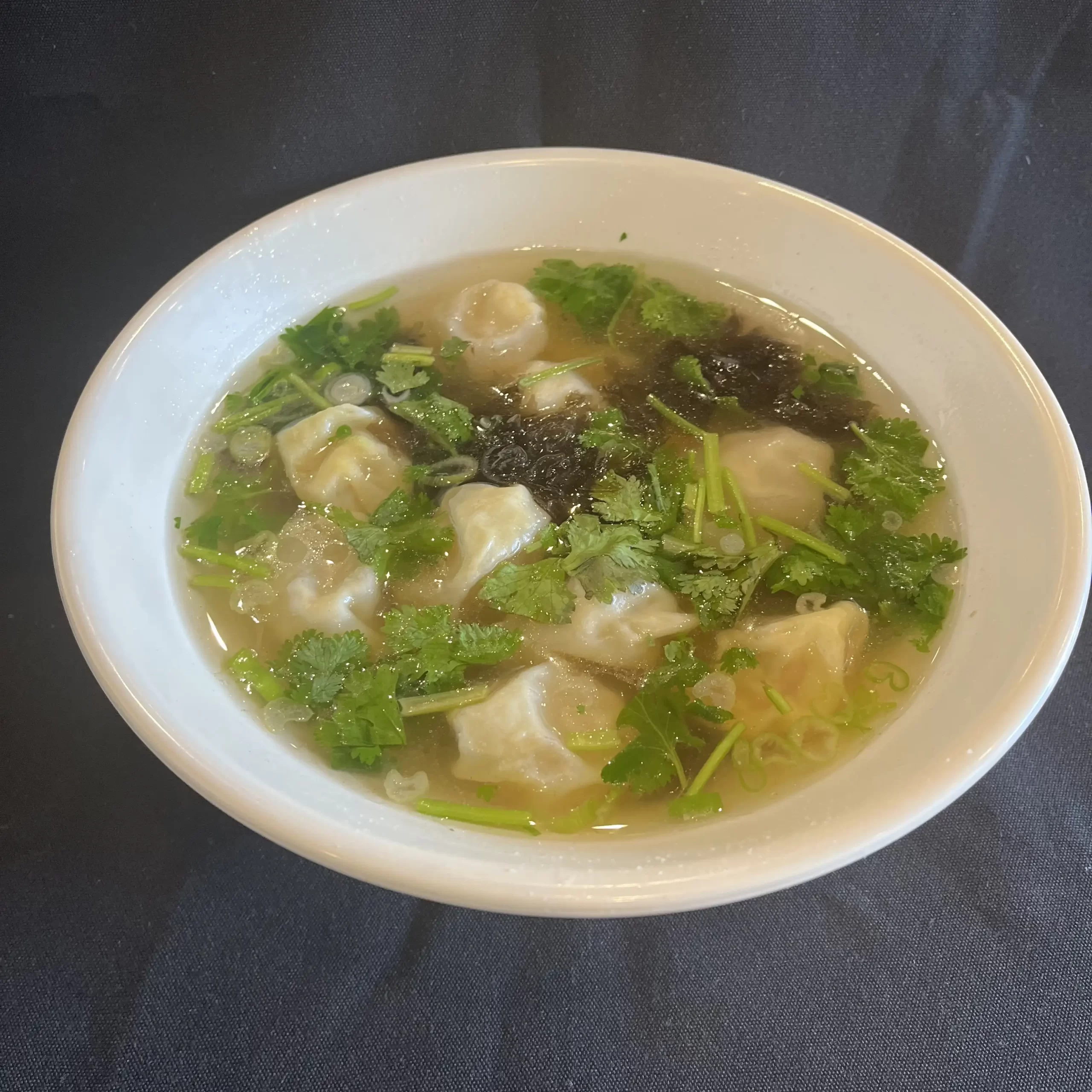 Shrimp & Pork Wonton Soup (10) – Ten shrimp and pork wontons in clear broth Ten shrimp and pork wontons in clear broth at Wonderful Hand-Pulled Noodle,a Chinese Noodle Restaurant in Orlando